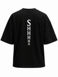 Black oversized T-shirt with SHHHH spine typography print, back view product shot on white background